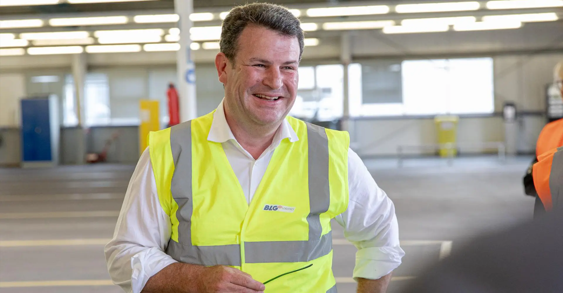Bundesarbeitsminister Hubertus Heil in BLG Logistics Warnweste (Photo)